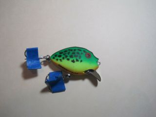 HEDDON 9630 PUNKIN SEED IN FLOURESCENT GREEN COACHDOG AND IN 2