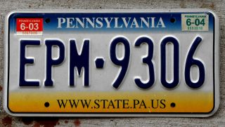 Yellow Blue And White Pennsylvania License Plate With 2003 And 2004 Stickers