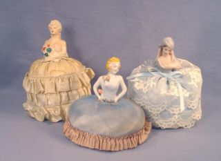 3 Vintage Pincushions.  Porcelain And Bisque.