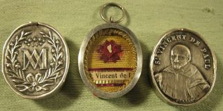 Antique Silver Locket Case With A Relic Of St.  Vincent De Paul.