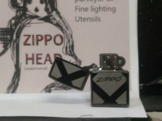 Black Chrome Laser Etched Zippo Advertisement Lighter 2005 2