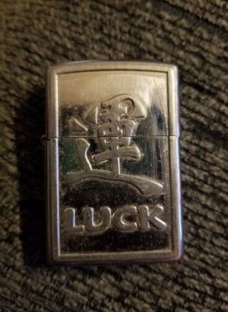 2007 Zippo Brushed Chrome Lighter " Luck Symbol " Well,