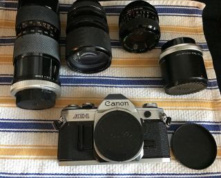 Canon Ae - 1 35mm Slr Film Vintage Camera With Multiple Lenses