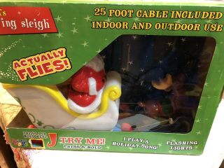 Vintage Small Tabletop Flying Santa Sleigh And Reindeer Blow Mold