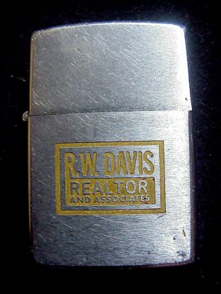 Zippo Vietnam Era Lighter With R.  W.  Davis And Associates Realtor Logo
