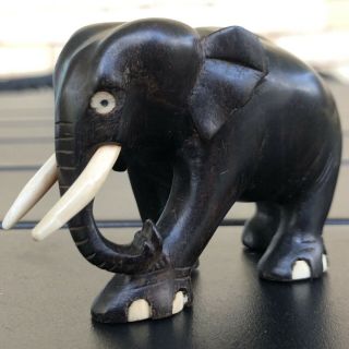 Vintage Hand Carved Wood Black Ebony Elephant Trunk Down Figurine