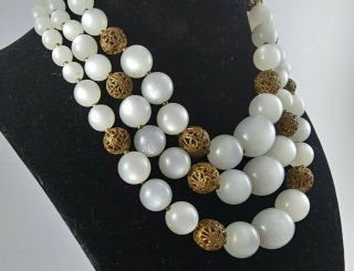 Vintage Gold Tone Filigree White Moon Glow Lucite Bead Triple Strand Necklace