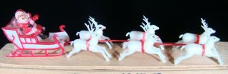 Vintage Miniature Santa,  Sleigh & 6 Reindeer.  Plastic.  Hong Kong 9 1/2 " Long