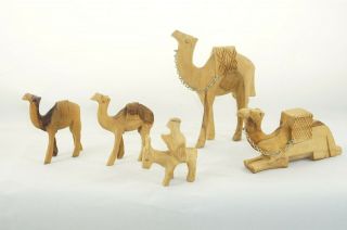 Vintage Hand Carved Wooden Camel Team Figurines 4 Camels 1 Donkey