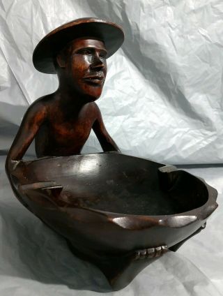 Vintage One Piece Solid Wood Hand Carved Ashtray Man Holding Bowl Pacific Island