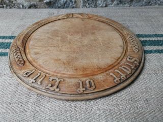 An Antique Carved Wooden Bread Board 2