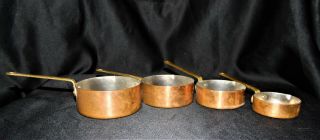 Set Of 4 Vintage Copper Measuring Cups With Brass Handles