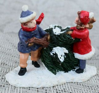 Mervyn ' s Christmas Village Figurine Kids Pulling Christmas Tree in Snow Vintage 2