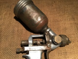 a vintage gravity fed spraygun with copper tank and aluminium handle BEN 2