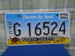North Dakota Official Vehicle License Plate Stamped