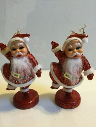 Vintage 2 Red Glitter Dancing Santa Claus Plastic Christmas Decoration 6 "