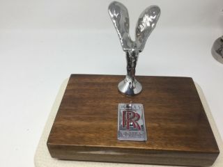 Rolls Royce Spirit Of Ecstacy Ornament On Red Radiator Plate With Wooden Base.