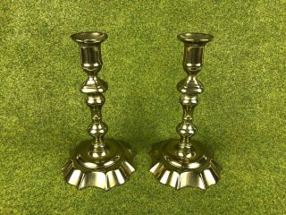 A George II 18th Century Hand Wrought Seamed Brass Candlesticks. 2
