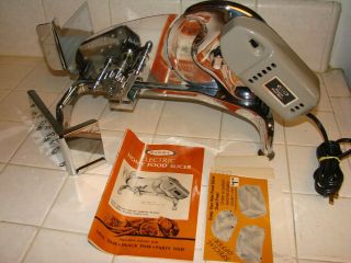 . VINTAGE RIVAL 1101E ELECTRIC FOOD SLICER CHROME PLATED. 2