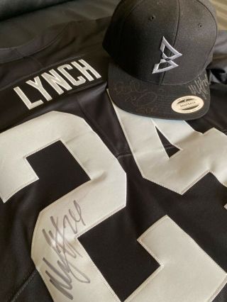 Marshawn Lynch Oakland Raiders Signed Jersey,  Beastmode Signed Hat Andre Ward