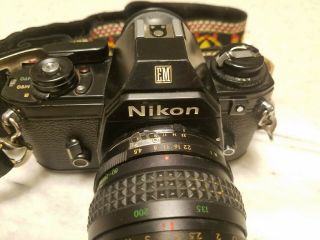 Vintage Nikon Em 35mm Slr Film Camera With Lens And Strap