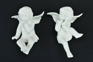 Vintage Set Of 2 Bisque Ceramic Shelf Sitter Sitting Angels Kissing 08143