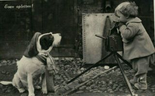 Md1674 Little Boy Taking A Picture With His Vintage Camers Of His Dressed Dog