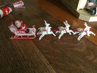Vintage Plastic Santa And 6 Reindeer