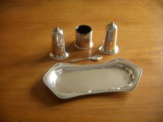 VINTAGE SILVER PLATED 3 - PIECE CRUET SET ON STAND BY MAKER D & S. 3