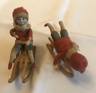 2 Antique German Heubach Children On Wood Sleds Spun Cotton Christmas Ornaments