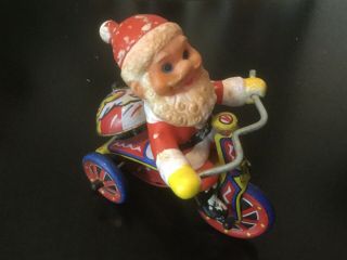 Vintage Christmas Santa Claus On Tricycle Wind Up Tin Metal Toy Bike Mtu Korea.
