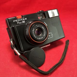 Vintage Pentax Pino 35 35mm Point And Shoot Camera W/ Lens Cap And Strap