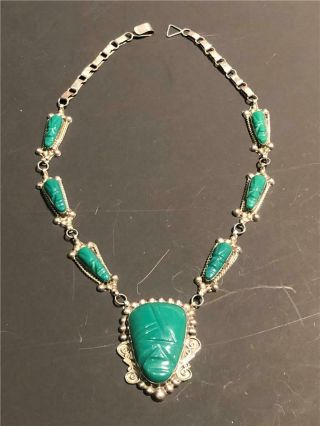 Vintage Mexico Sterling Silver And Carved Green Glass Face Pendant Necklace
