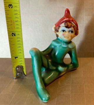 Vintage 1950s Green 3” Reclining Pixie Elf Red Hat Ceramic Christmas Figurine