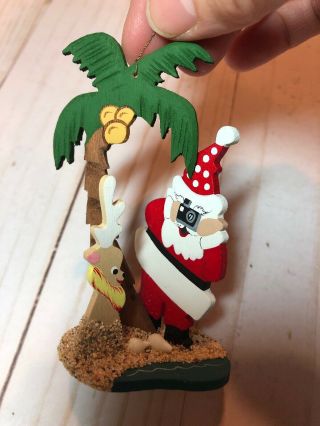 Vintage Emgee Hawaiian Wooden Ornament: Santa Taking Picture Of Reindeer Beach