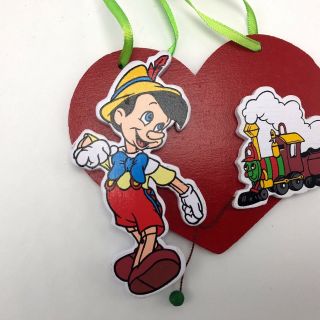 Vintage Kurt Adler Disney Pinocchio Toy Train Ornament Wood Heart 4.  5 " Christmas