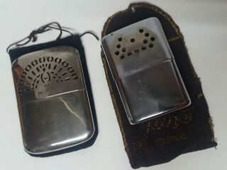 2 Vintage Jon - E & Peterson Hand Warmers With Cases