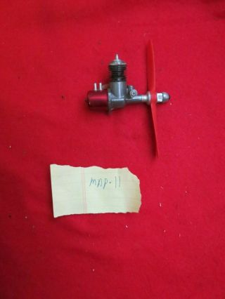 Vintage Ok Cub.  049 Model Airplane Engine,  Complete With Propeller.  Unit.