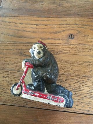 Vintage Hand Painted Cast Iron Monkey On Scooter Figure