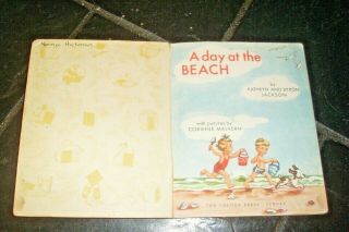 VINTAGE GOLDEN BOOK ' A DAY AT THE BEACH ' - CORINNE MALVERN - BY COLOURTONE 2