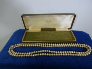 Vintage Stella Two Strand Simulated Pearls With Sterling Silver Flower Clasp.