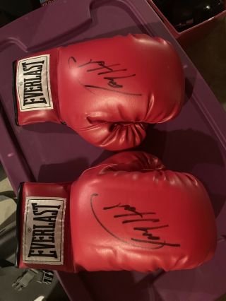 Larry Holmes Autographed Everlast Red Boxing Glove,