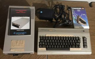Vintage Commodore 64 Personal Computer With 5.  25 Inch Floppy Disk Drive 1541