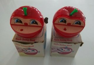 2 X Vintage 1970s Apple Bank Wind - Up Money Boxes Made In Hong Kong