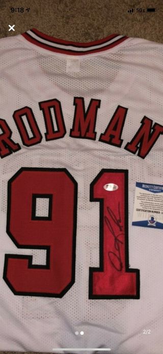 Autographed/signed Dennis Rodman White Bulls Basketball Jersey Beckett