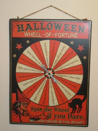Vintage Looking Orange And Black Metal Halloween Wheel Of Fortune Sign