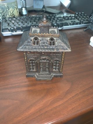 Vintage Cast Iron State Bank Coin Bank.  Still Bank