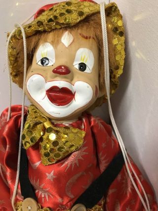VINTAGE CLOWN WITH PORCELIAN FACE ON SWING 2