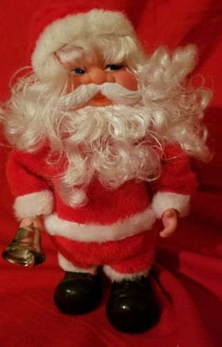 Vintage “walking 10 " Santa Claus Musical Toy Jingle Bells