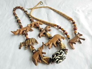 2 Vintage African Handcarved Wood Animal Necklaces
